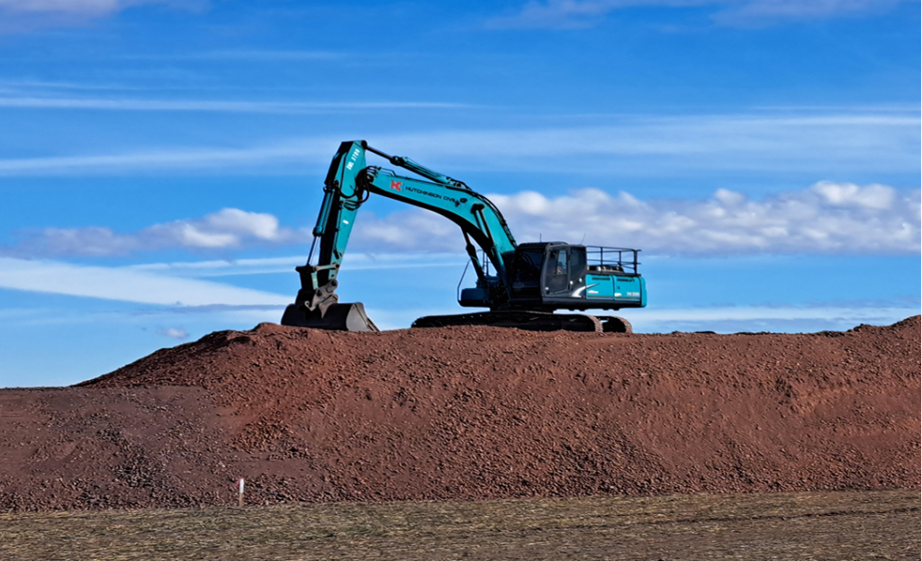 Excavator performing bulk earthworks in Albury–Wodonga